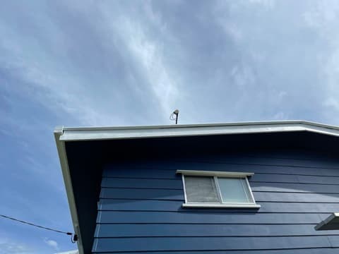 Blue gable cladding